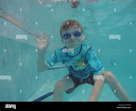 Young Boy is Cumming Underwater .